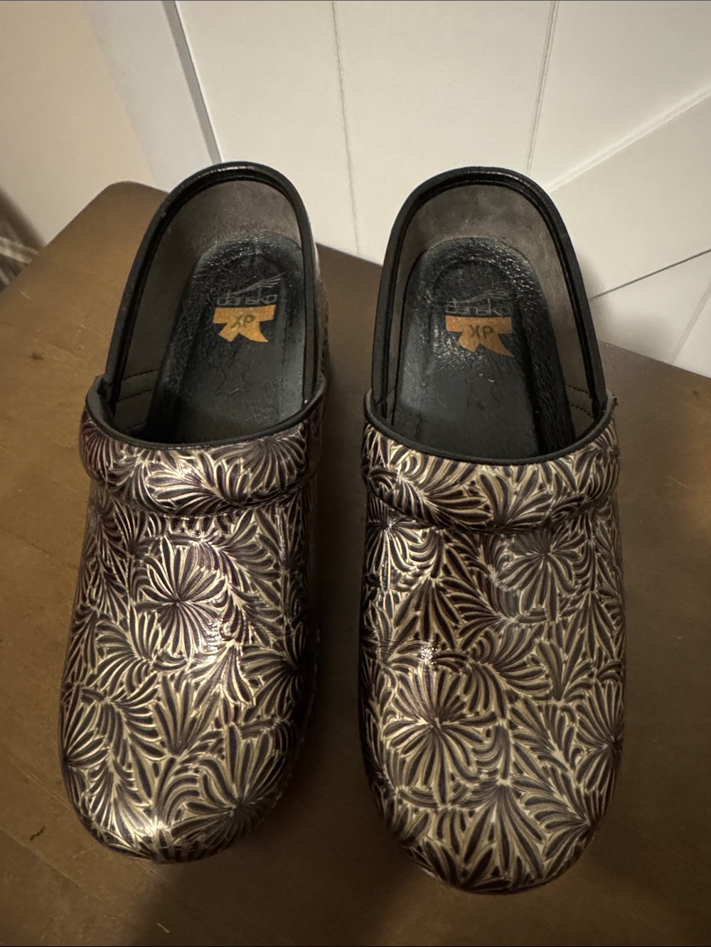 Dansko Women’s Embossed Floral Clogs - Gold and Black